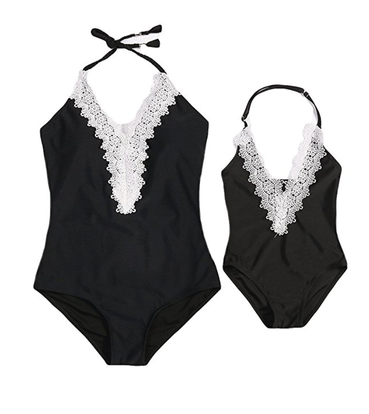 Matching mother-daughter bathing suits. Black one-piece bathing suits