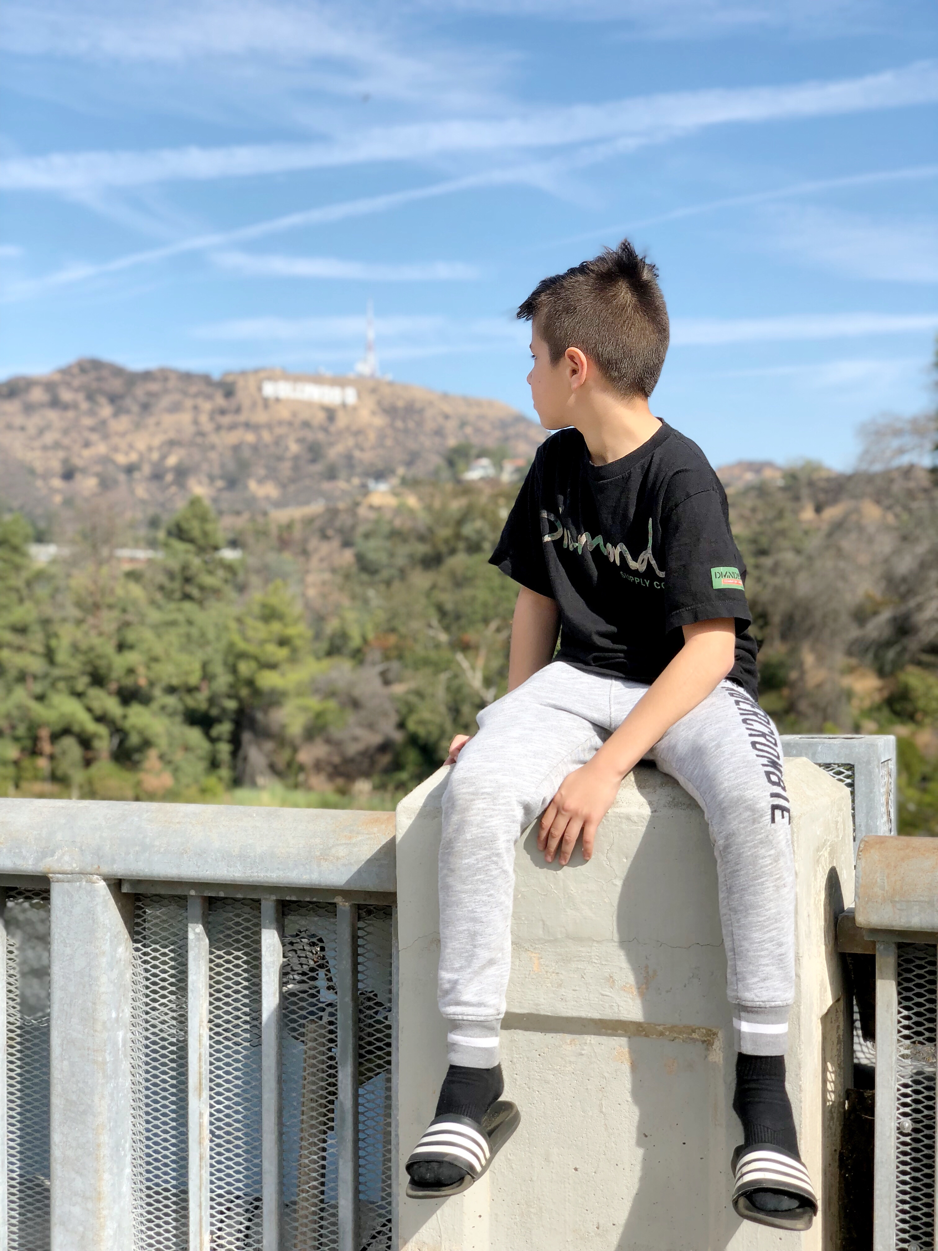 A boy overlooking the hollywood hills